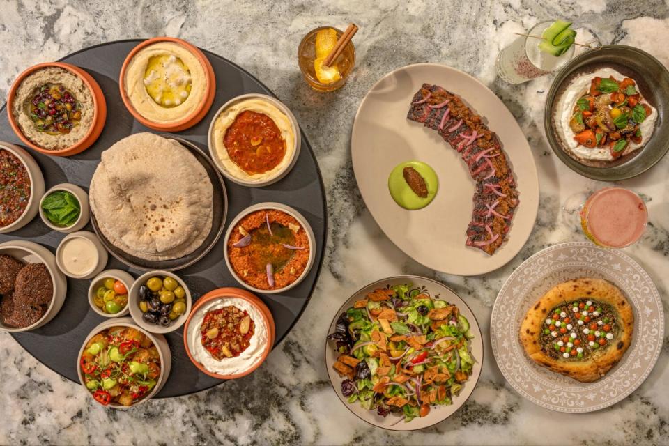 A full spread of dishes at Ladyhawk in Los Angeles.