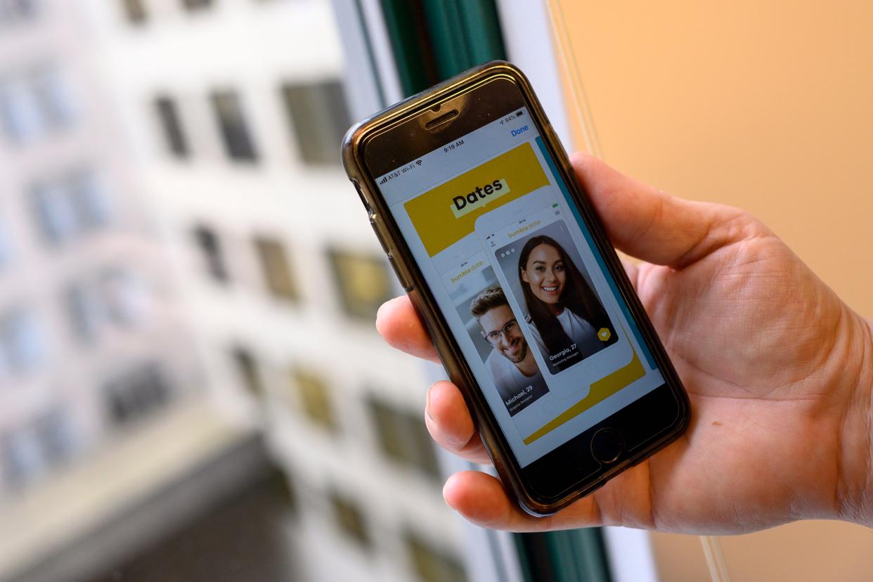 Employees of the popular dating app Bumble will receive a fully paid week off in June to avoid pandemic burnout. (AFP via Getty Images)