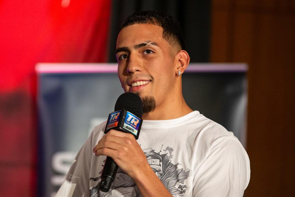 John Rincon, a Corpus Christi professional fighter, is interviewed on an upcoming fight during a Top Rank press conference at the American Bank Center on Wednesday, Sept. 13, 2023, in Corpus Christi, Texas.