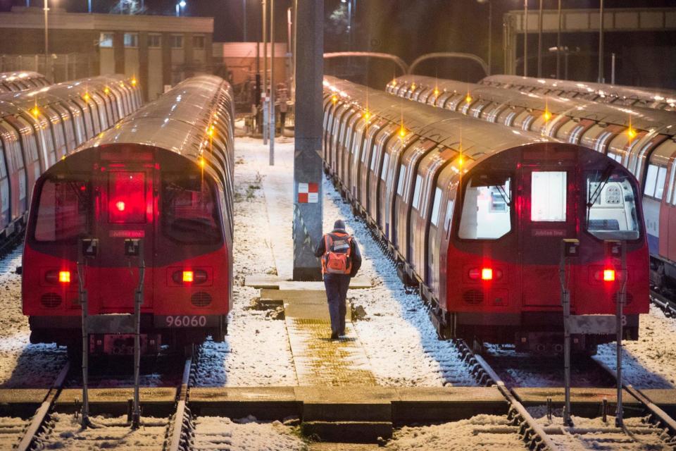 Chill: Tube trains covered in snow this morning