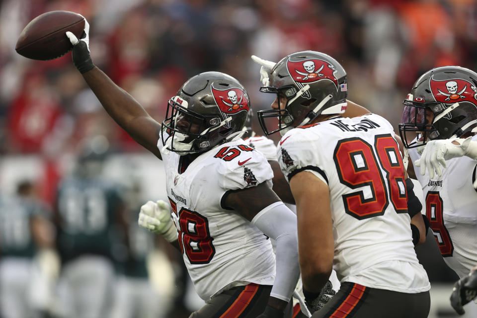 Tampa Bay Buccaneers outside linebacker Shaquil Barrett (58) celebrates after he intercetped a pass by Philadelphia Eagles quarterback Jalen Hurts (1) during the second half of an NFL wild-card football game Sunday, Jan. 16, 2022, in Tampa, Fla. (AP Photo/Mark LoMoglio)