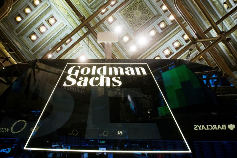 FILE PHOTO: Goldman Sachs sign is seen above floor of the New York Stock Exchange shortly after the opening bell in the Manhattan borough of New York