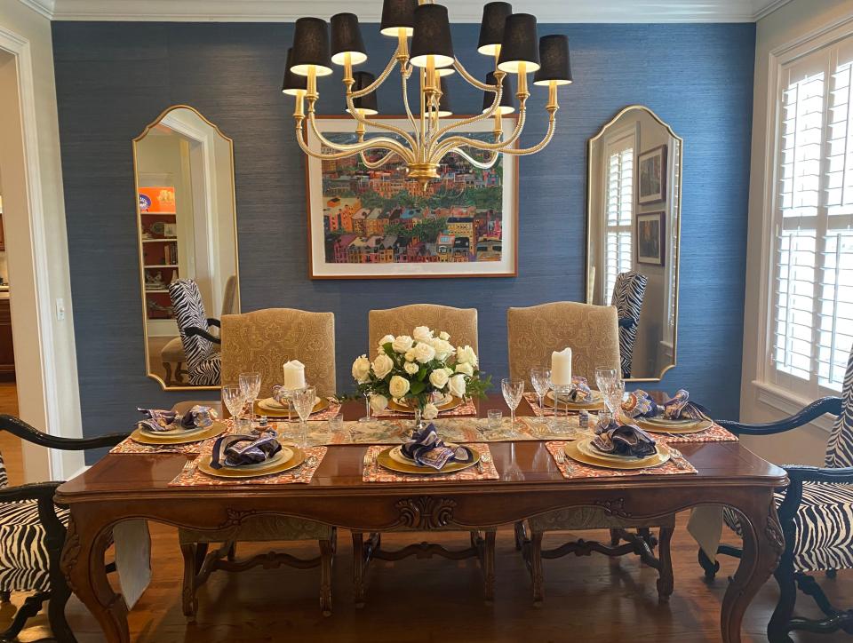 AFTER: Marni's goal was to move away from the traditional furnishings to make the dining room more "transitional."