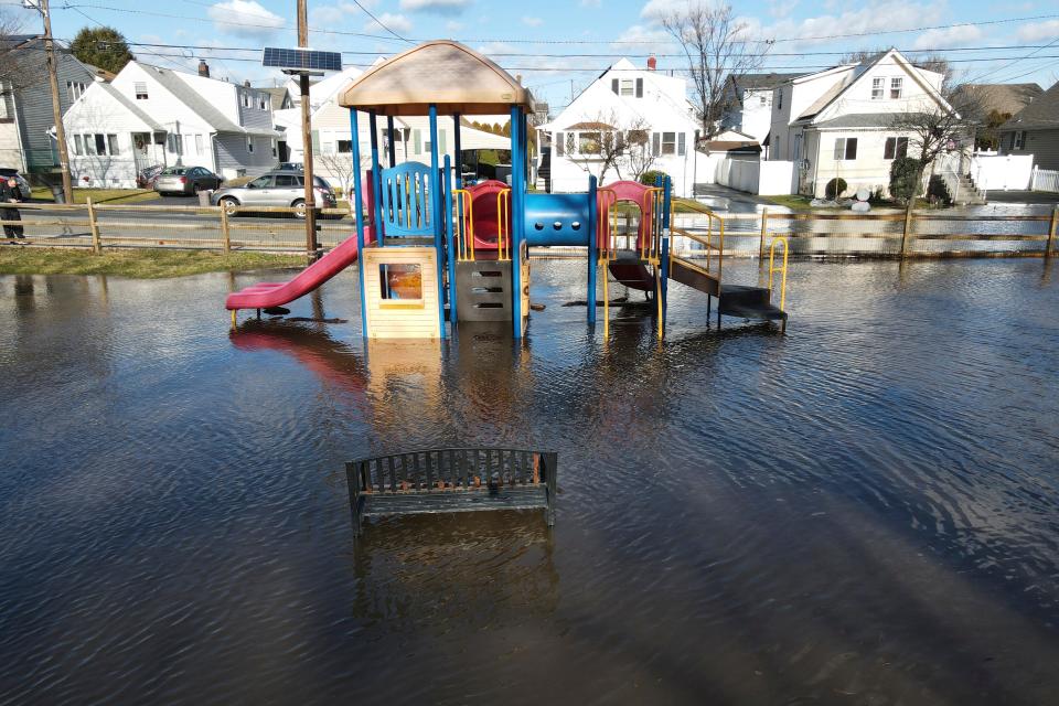 Flood waters inundate a playground in Lodi, N.J., on Wednesday, Jan. 10, 2024.