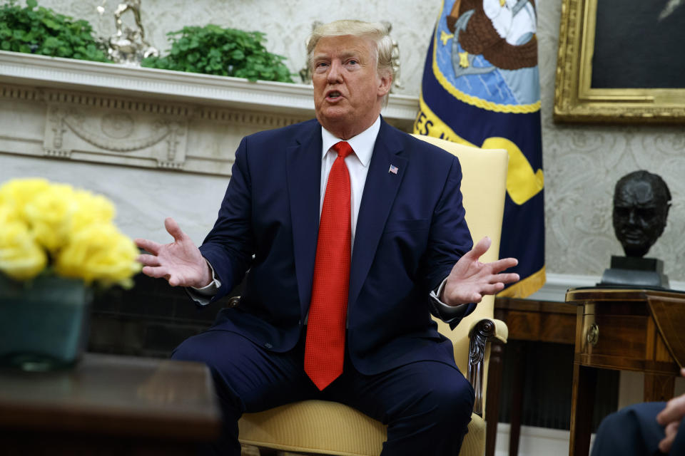 President Donald Trump talks about a plan to ban most flavored e-cigarettes, in the Oval Office of the White House, Wednesday, Sept. 11, 2019, in Washington. (AP Photo/Evan Vucci)