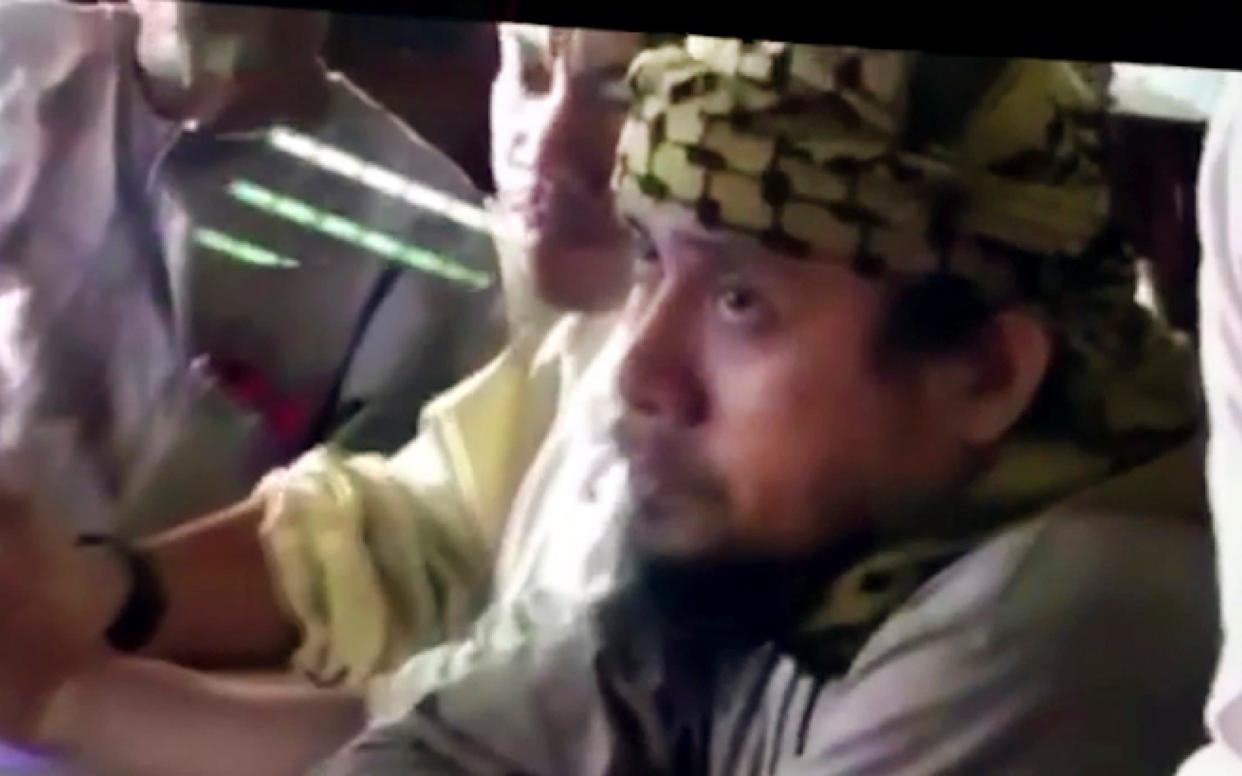 Isnilon Hapilon, seen here in an Isil video, was among the FBI's most-wanted terror suspects - APTN