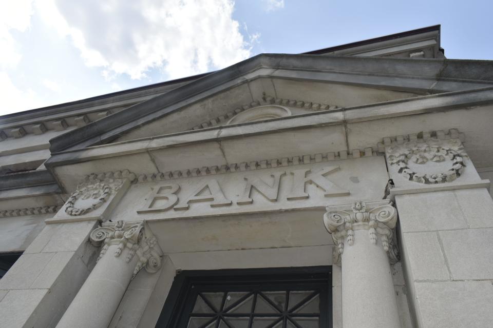 The limestone front of a former bank on Gosport's Main Street.