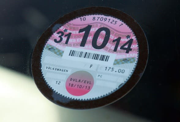  DETAILS OBSCURED BY PA PICTURE DESK A car tax disc. After more than 90 years affixed to British motorists' cars, the tax disc is to be scrapped and replaced with a modern electronic system, Chancellor George Osborne will announce today. 