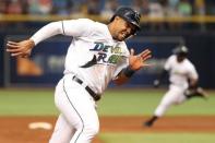 Jun 9, 2018; St. Petersburg, FL, USA; Tampa Bay Rays right fielder Carlos Gomez (27) runs home to score a run during the third inning against the Seattle Mariners at Tropicana Field. Mandatory Credit: Kim Klement-USA TODAY Sports