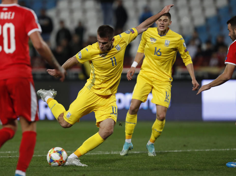 Ukraine's Artem Besedin scores his side's second goal during the Euro 2020 group B qualifying soccer match between Serbia and Ukraine, on the stadium Rajko Mitic in Belgrade, Serbia, Sunday, Nov. 17, 2019. (AP Photo/Darko Vojinovic)