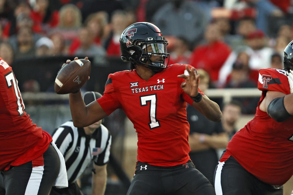 FILE - Texas Tech's Donovan Smith (7) throws a pass during the second half of an NCAA college football game against Iowa State, on Nov. 13, 2021, in Lubbock, Texas. Smith started the final four games last year, including a bowl victory. (AP Photo/Brad Tollefson, File)