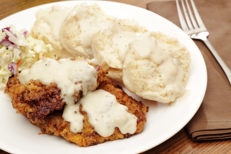 <p><strong>State Meal: Chicken-fried steak, barbequed pork, fried okra, squash, cornbread, grits, corn, sausage with biscuits and gravy, black-eyed peas, strawberries, and pecan pie</strong></p><p>In 1988, declared April 19 to be Oklahoma Meal Day. The state meal consists of yummy local faves that<a href="https://www.okhistory.org/publications/enc/entry.php?entry=ST023" rel="nofollow noopener" target="_blank" data-ylk="slk:reflect the culture and history of the state.;elm:context_link;itc:0;sec:content-canvas" class="link "> reflect the culture and history of the state.</a></p>