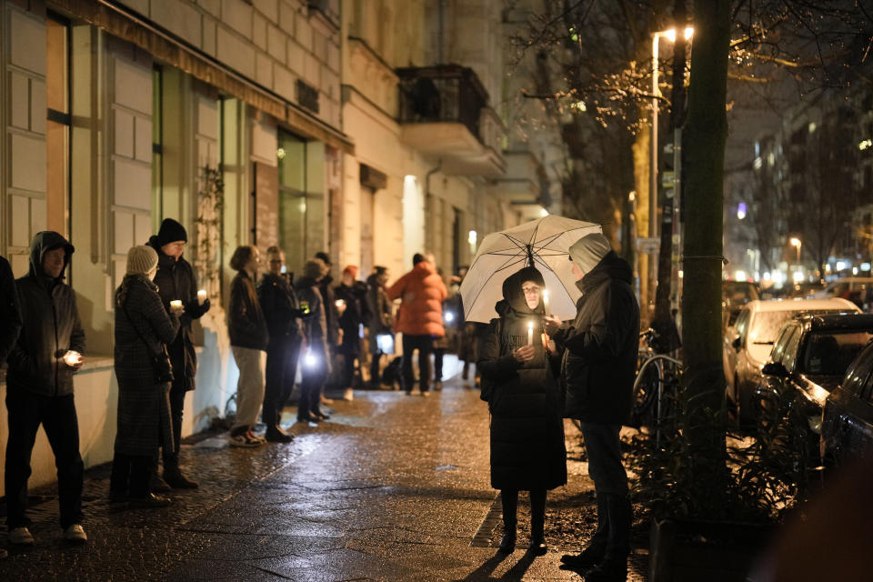 People alarmed by the growing popularity and policies of the far-right Alternative for Germany, or AfD party, attend a vigil in the Prenzlauer Berg neighborhood in Berlin, Sunday, Feb. 11, 2024. Millions of Germans have joined rallies and even held weekly vigils in their neighborhoods to express their frustration with growing support for far-right populism at the ballot box. (AP Photo/Markus Schreiber)