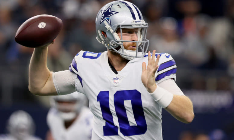 Dallas Cowboys quarterback Cooper Rush on the field.