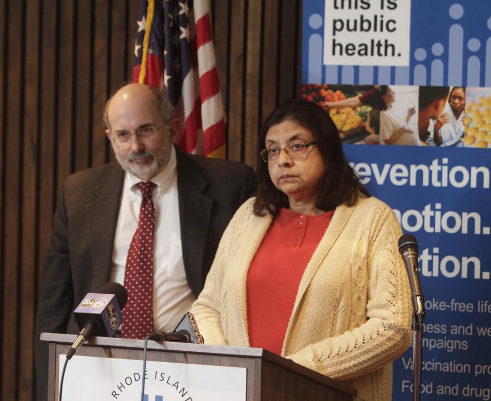 Dr. Uptala Bandy, right, in a 2013 file photo. At left is former Director of Health Dr. Michael Fine.