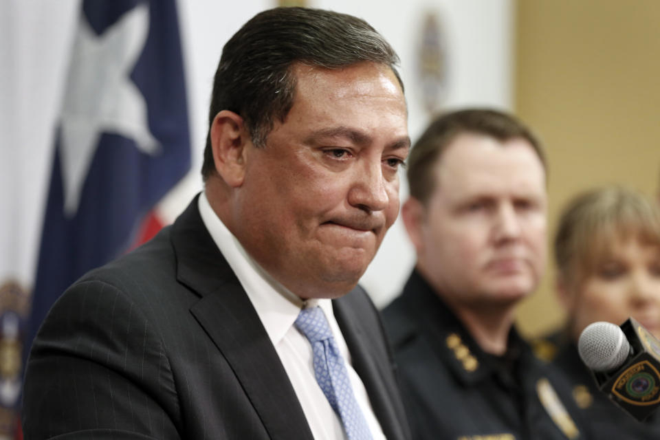 Houston Police Chief Art Acevedo address charges against two police officers in the fatal drug raid, Friday, Aug. 23, 2019, in Houston. A former Houston police officer has been charged with murder in connection with the deadly January drug raid of a home that killed a couple who lived there and injured five officers, prosecutors announced Friday. (Steve Gonzales/Houston Chronicle via AP)