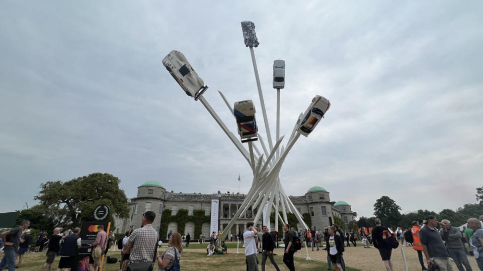 Goodwood’s dramatic central sculpture featured iconic cars from BMW M division’s half-century of existence. - Credit: Laura Burstein