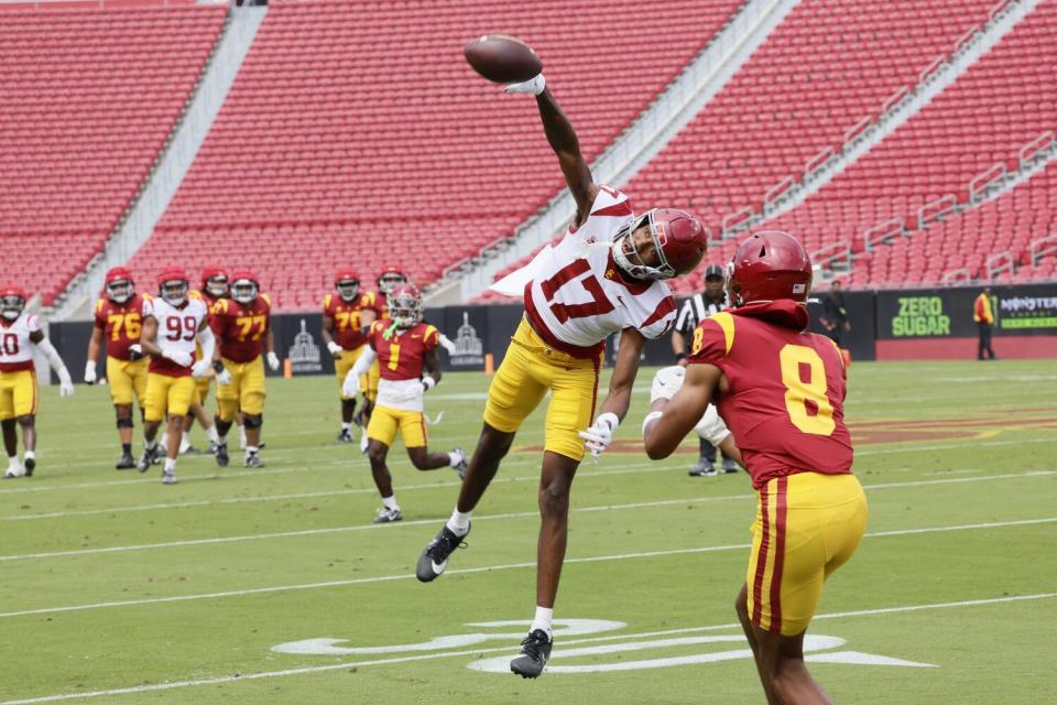 USC cornerback DeCarlos Nicholson deflects a pass intended for wide receiver Ja'Kobi Lane.