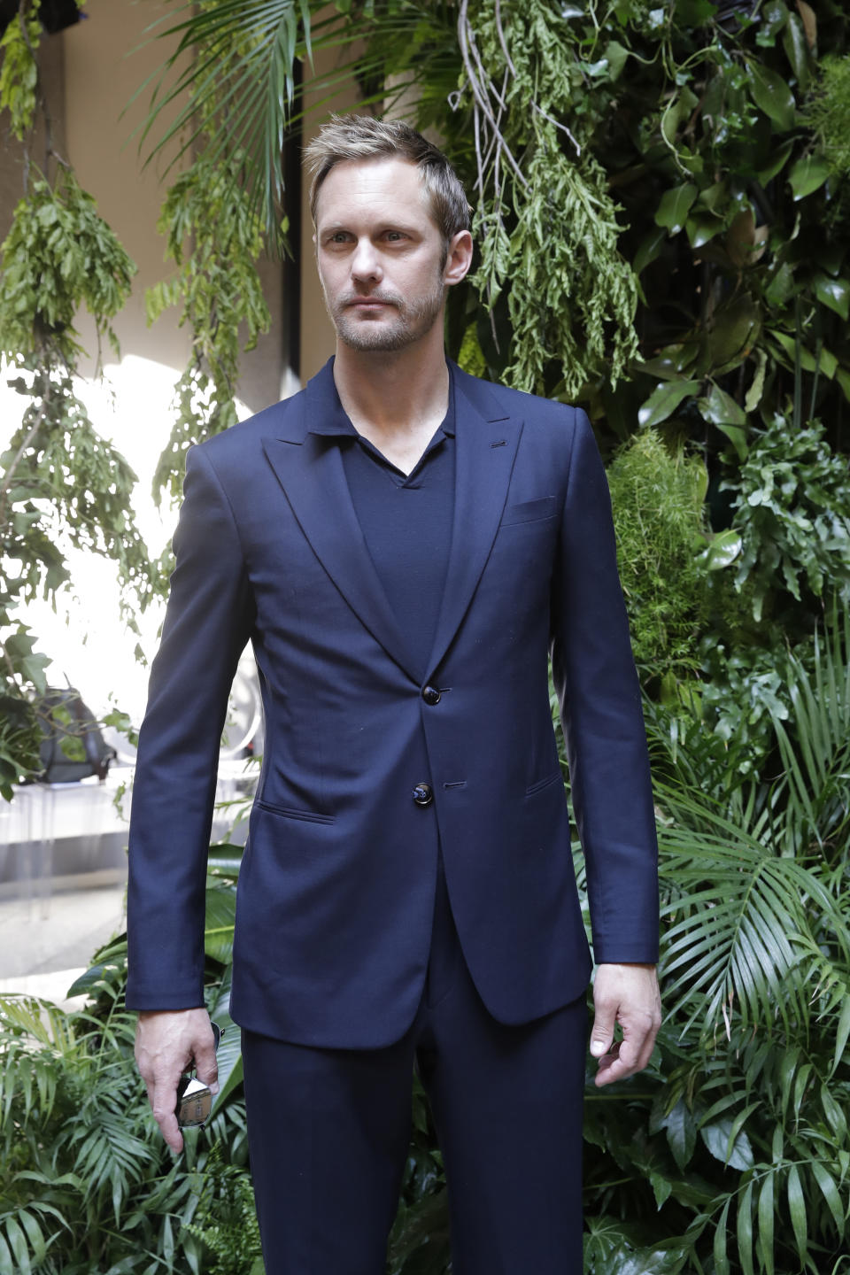 Actor Alexander Skarsgard attends the Armani men's Spring-Summer 2020 collection, unveiled during the fashion week, in Milan, Italy, Monday, June 17, 2019. (AP Photo/Luca Bruno)