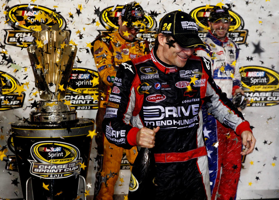 RICHMOND, VA - SEPTEMBER 10: Jeff Gordon, driver of the #24 Drive to End Hunger Chevrolet, celebrates with Kyle Busch, driver of the #18 M&M's Toyota, and Jimmie Johnson, driver of the #48 Lowe's/Power of Pride Chevrolet, after clinching spots in the "Chase for the Sprint Cup" following the NASCAR Sprint Cup Series Wonderful Pistachios 400 at Richmond International Raceway on September 10, 2011 in Richmond, Virginia. (Photo by Jeff Zelevansky/Getty Images)