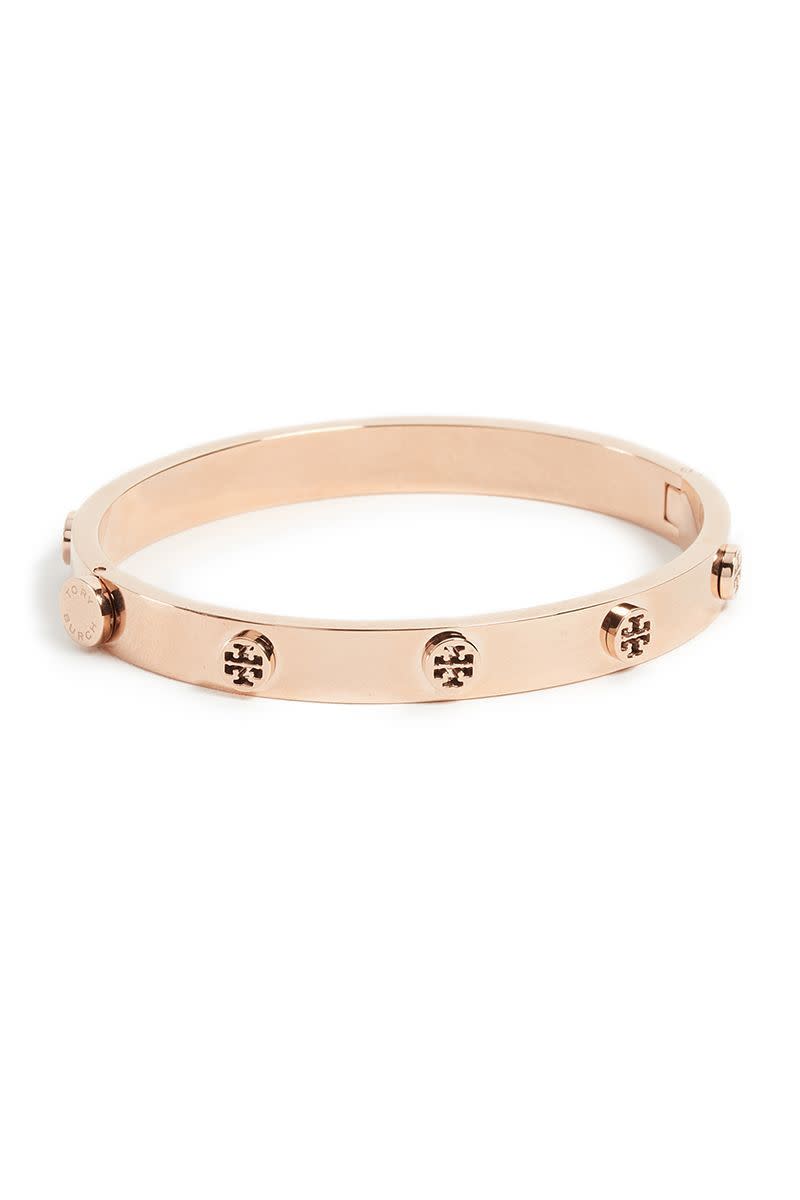 <p><strong>Tory Burch</strong></p><p>amazon.com</p><p><strong>$178.00</strong></p><p><a href="https://www.amazon.com/dp/B01NCTGIZJ?tag=syn-yahoo-20&ascsubtag=%5Bartid%7C10056.g.36664390%5Bsrc%7Cyahoo-us" rel="nofollow noopener" target="_blank" data-ylk="slk:Shop Now" class="link ">Shop Now</a></p><p>Here's a minimalist's way back into logomania. Studded with Tory Burch's signature logo, this bracelet looks great stacked or solo.</p>