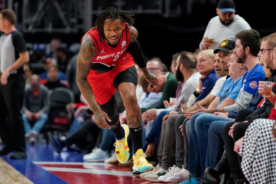 Portland Trail Blazers guard Ben McLemore reacts after hitting a basket against the Portland Trail Blazers in the first half of an NBA basketball game in Detroit, Monday, March 21, 2022.