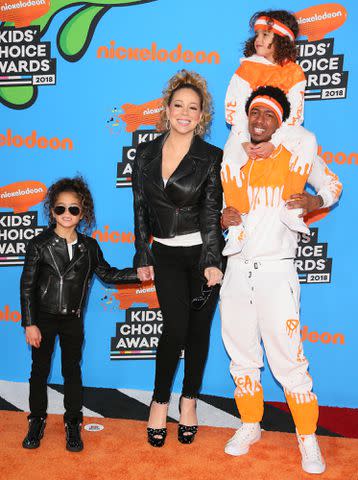 EAN-BAPTISTE LACROIX/AFP via Getty Mariah Carey and Nick Cannon at the 2018 Kids Choice Awards