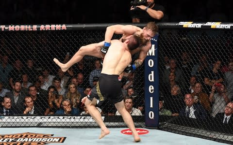 Scenes of utter mayhem here in Sin City as the biggest mixed martial arts event in history ended in a mass brawl between the teams of the two headline contenders, combat sports star Conor McGregor, of Ireland, and Dagestan's Khabib Nurmagomedov, who retained his Ultimate Fighting Championship lightweight crown by submitting his rival in the fourth round.