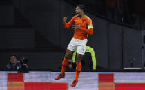 Netherland's Virgil Van Dijk celebrates after scoring the opening goal during the UEFA Nations League soccer match between The Netherlands and Germany at the Johan Cruyff ArenA in Amsterdam, Saturday, Oct. 13, 2018. (AP Photo/Peter Dejong)