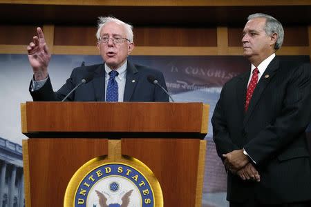 U.S. Senate Veterans' Affairs Committee Chairman Bernie Sanders (I-VT) (L) and House Veterans' Affairs Committee Chairman Jeff Miller (R-FL) announce bipartisan legislation to address problems in the VA health care system, at the U.S. Capitol in Washington July 28, 2014. REUTERS/Jonathan Ernst