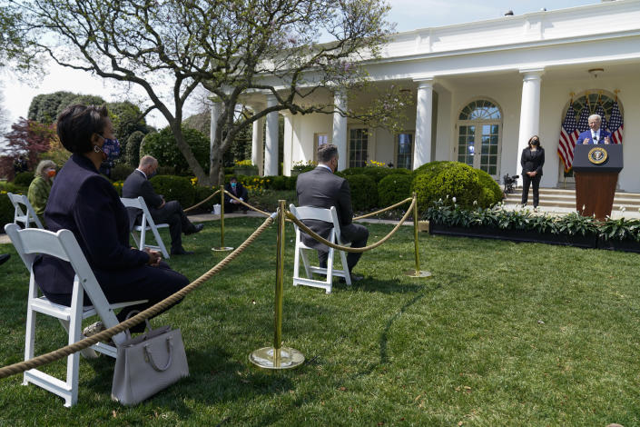 District of Columbia Mayor Muriel Bowser, left, listens as President Joe Biden, accompanied by Vice President Kamala Harris, speaks about gun violence prevention in the Rose Garden at the White House, Thursday, April 8, 2021, in Washington. (AP Photo/Andrew Harnik)