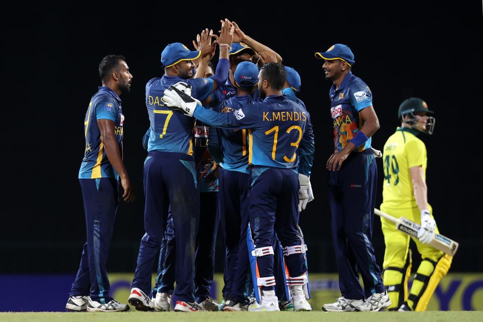 Chamika Karunaratne, pictured here celebrating with teammates after dismissing Steve Smith in the second ODI.