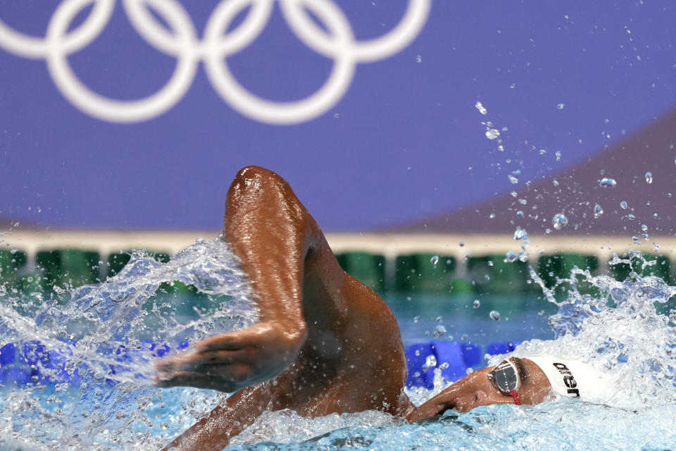 Ahmed Hafnaoui, of Tunisia, swims in the final of the men's 400-meter freestyle at the 2020 Summer Olympics, Sunday, July 25, 2021, in Tokyo, Japan. (AP Photo/Martin Meissner)