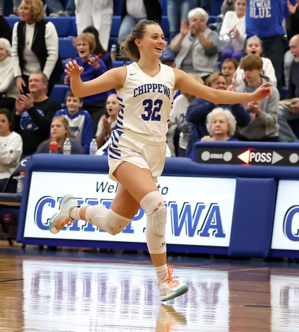 Chippewa's Abby Henegar races across the court to hug fellow senior Kendal Shiarla as the clock hit triple zeroes in their win over Smithville.