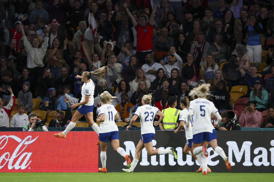 England's Georgia Stanway, left, celebrates after scoring the opening goal during the Women's World Cup Group D soccer match between England and Haiti in Brisbane, Australia, Saturday, July 22, 2023. (AP Photo/Tertius Pickard)