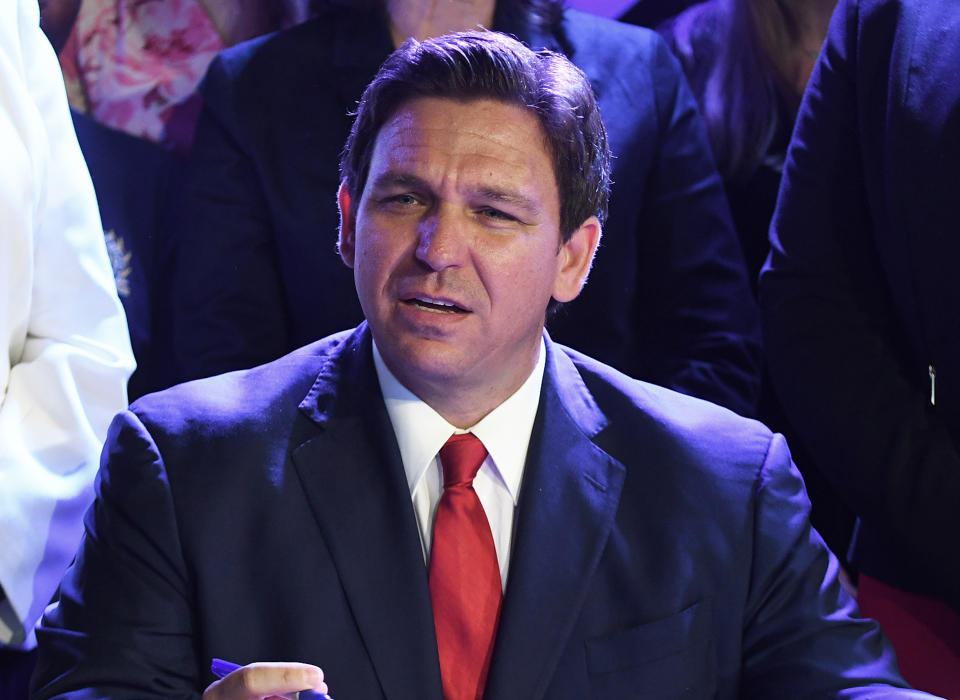 KISSIMMEE, FLORIDA, UNITED STATES - 2022/04/14: Governor Ron DeSantis signs Floridaâ€™s 15-week abortion ban into law at Nacion de Fe church in Kissimmee. The law, which goes into effect July 1, bans the procedure after 15 weeks of pregnancy without exemptions for rape, incest or human trafficking, but does allow exemptions in cases where a pregnancy is â€œserious riskâ€ to the mother or a fatal abnormality is detected if two physicians confirm the diagnosis in writing. (Photo by Paul Hennessy/SOPA Images/LightRocket via Getty Images)