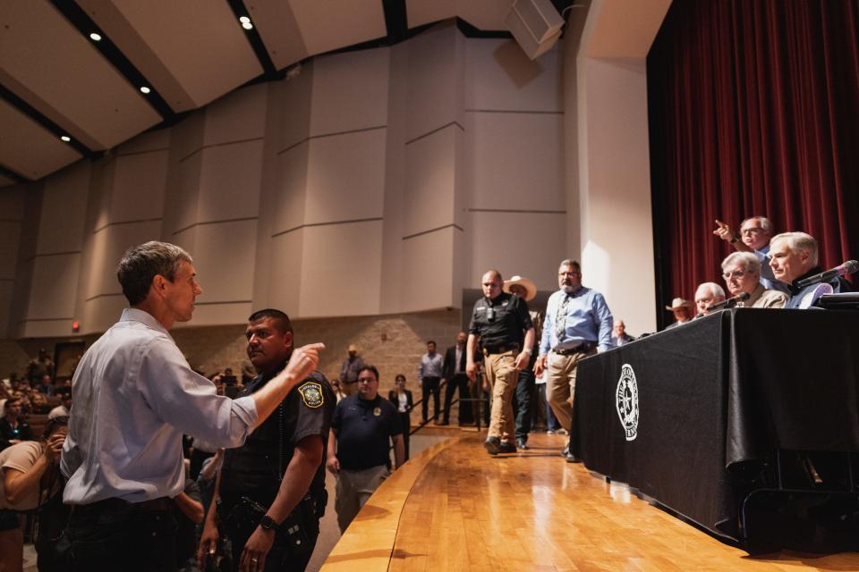 Democratic gubernatorial candidate Beto O'Rourke interrupts a news conference held by Texas Gov. Greg Abbott on May 25, 2022, in Uvalde, Texas.
