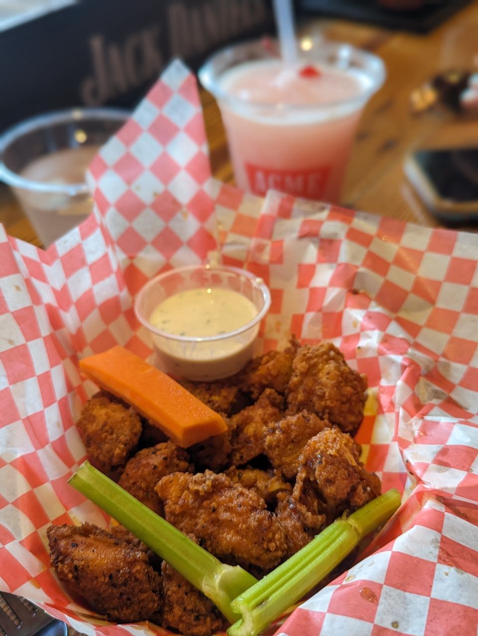 Hot chicken bites and frose at Acme Feed and Seed.