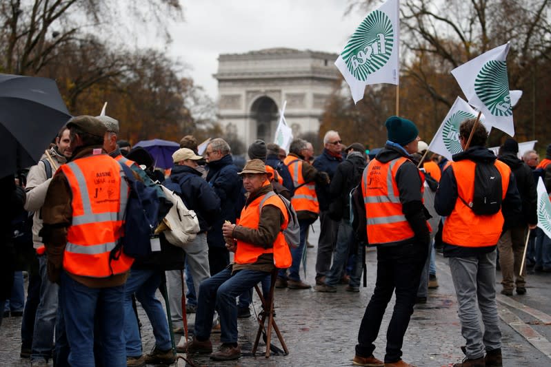 French farmers gather near the Arc de Triomphe during a day of protest in Paris