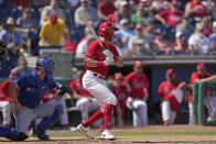 Philadelphia Phillies' Kody Clemens hits a single against the Toronto Blue Jays during the fourth inning of a spring training baseball game Tuesday, Feb. 28, 2023, in Clearwater, Fla. (AP Photo/David J. Phillip)