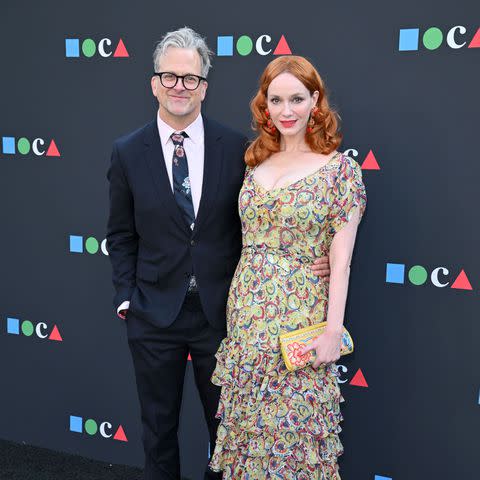 <p>Axelle/Bauer-Griffin / Getty Images</p> George Bianchini and Christina Hendricks