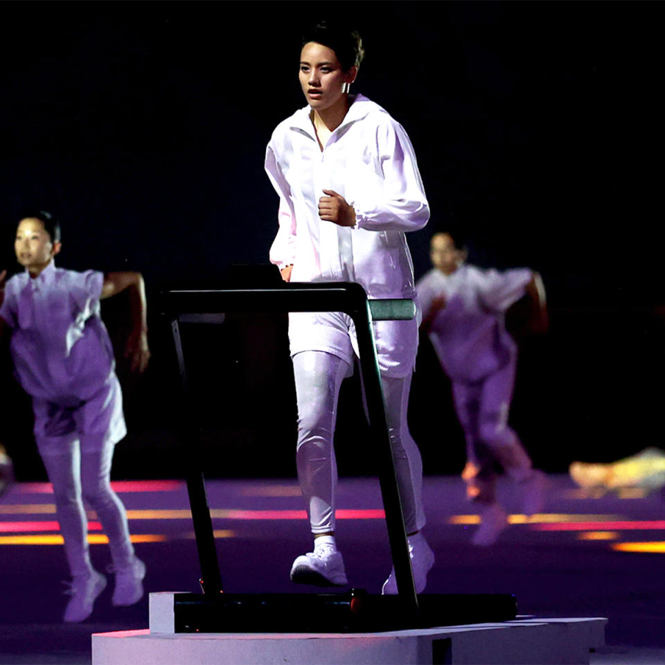 Boxer Arisa Tsubata at the opening ceremony on the treadmill (NBC Olympics)