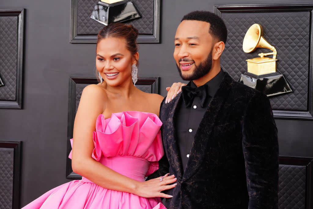 Teigen suffered a pregnancy loss in September 2020, pictured with husband John Legend in April 2022. (Getty Images)