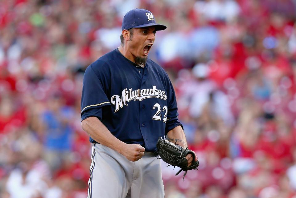 Matt Garza celebrates after the final out of the 1-0 win over the Cincinnati Reds at Great American Ball Park on July 5, 2014.