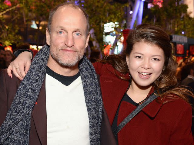 <p>Michael Kovac/Getty</p> Woody Harrelson and daughter Zoe Harrelson attend "Hunger Games: Mockingjay Part 2" on November 16, 2015 in Los Angeles, California.