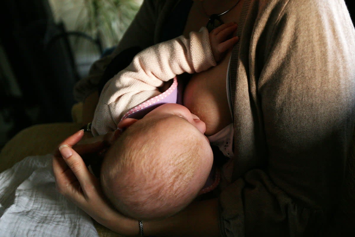 Mothers who breastfeed their children are less likely to give them sugary treats (File picture) (PA)