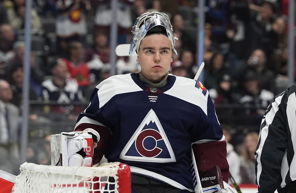 Colorado Avalanche goaltender Justus Annunen waits for play to resume in the second period of an NHL hockey game against the Colorado Avalanche, Monday, March 4, 2024, in Denver. (AP Photo/David Zalubowski)