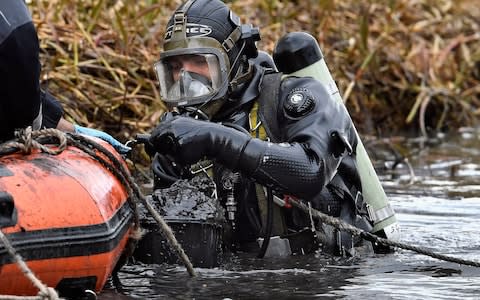 Police Scotland diver searches a canal stretch for an eleven year old schoolgirl Moira Anderson on March 20, 2017 in Coatbridge, Scotland - Credit: Getty Images Europe