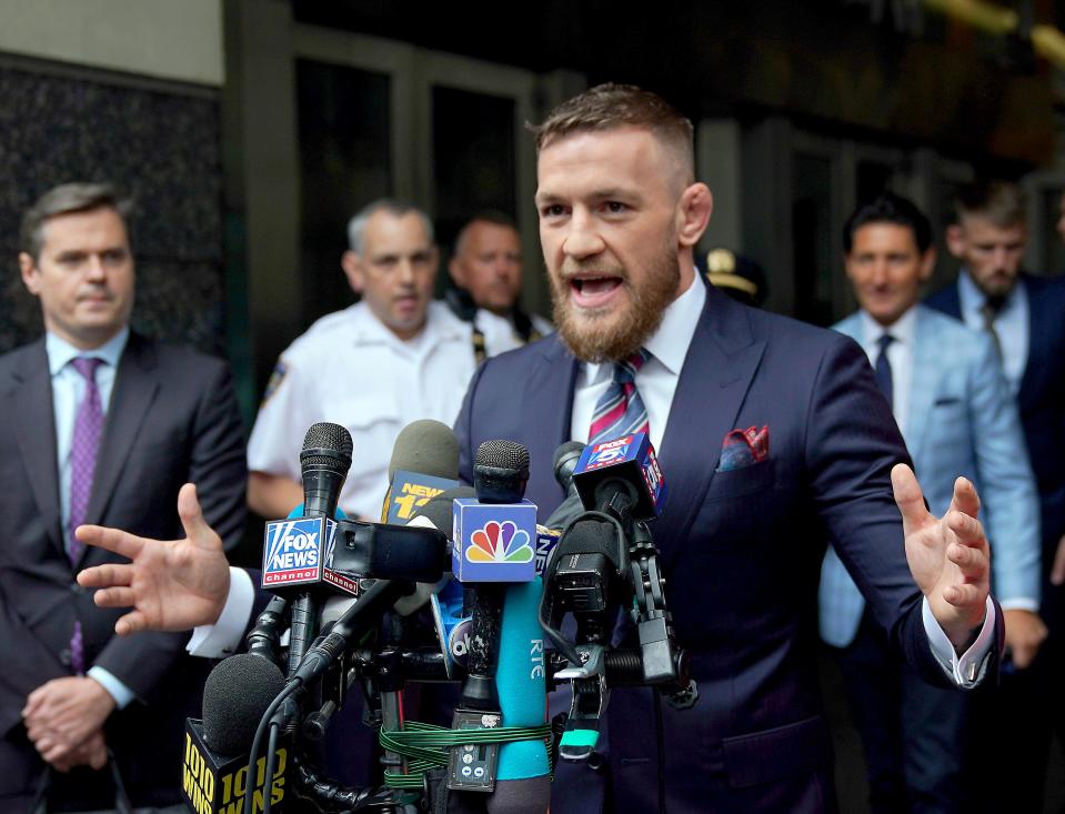 Conor McGregor reached a plea deal on assault charges stemming from an April incident in which he threw objects at a charter bus full of UFC fighters and employees. (Getty Images)