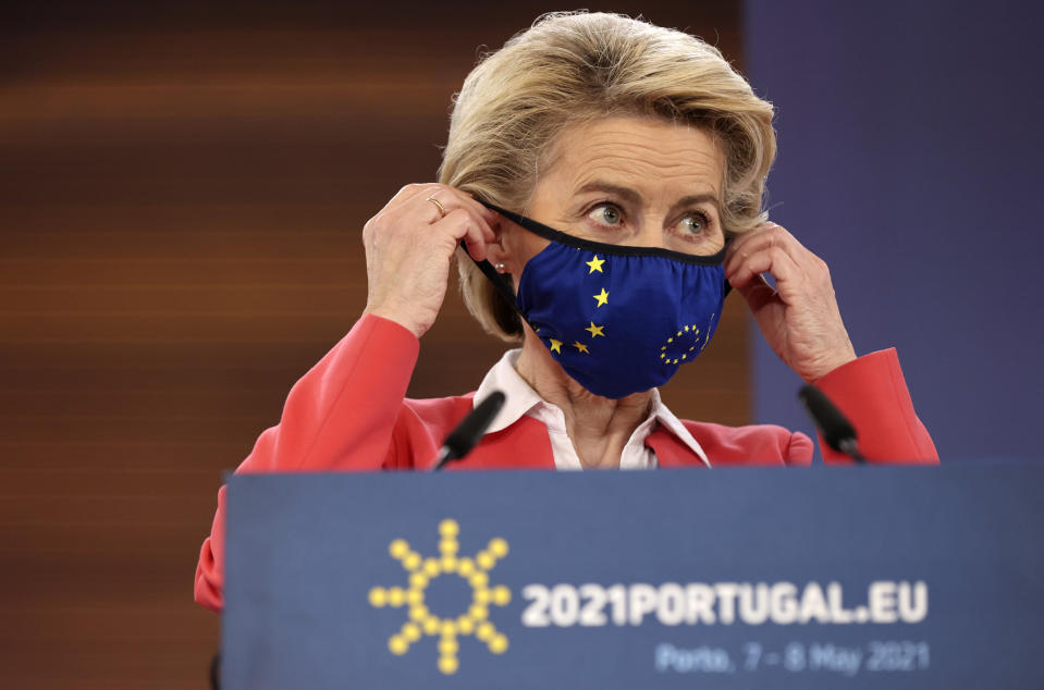 European Commission President Ursula von der Leyen puts on her protective face mask at the conclusion of a media conference at an EU summit in Porto, Portugal, Saturday, May 8, 2021. On Saturday, EU leaders held an online summit with India's Prime Minister Narendra Modi, covering trade, climate change and help with India's COVID-19 surge. (AP Photo/Luis Vieira)